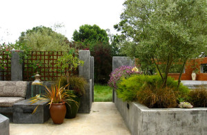 Creative ways to use concrete planters in your landscape